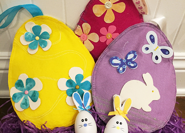 Welcome Spring and Easter with these cute door hangers. Hide sweet treats in the handy pocket on the back of the door hanger.