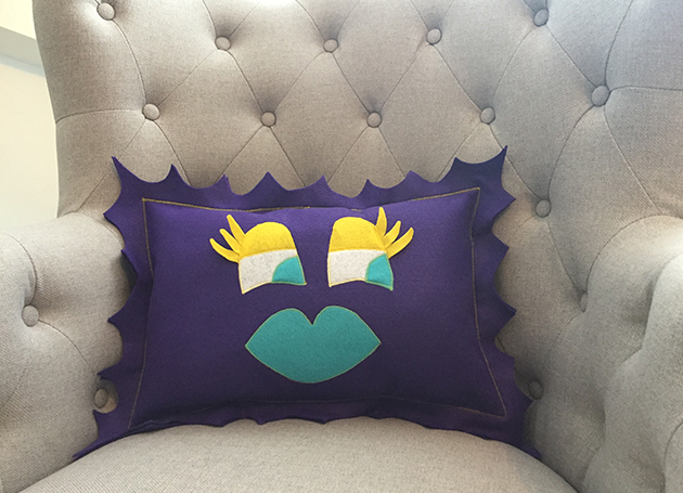 Snuggle up with a pillow that takes you from day to night with ease.  This fun-to-squeeze double-sided pillow has a wide-eyed expression on one side, and flips over to reveal a sleepy face on the other side.